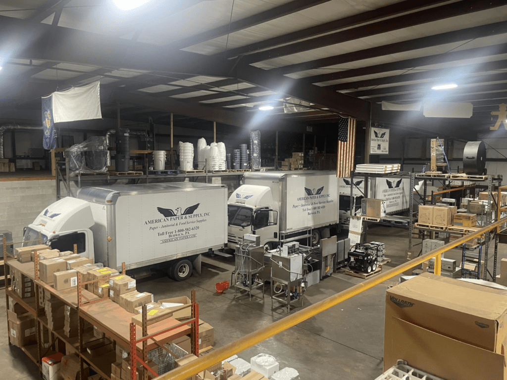 Interior warehouse view of the fleet of delivery vehicles that will complete your business orders with American Paper and Supply, Pennsylvania.